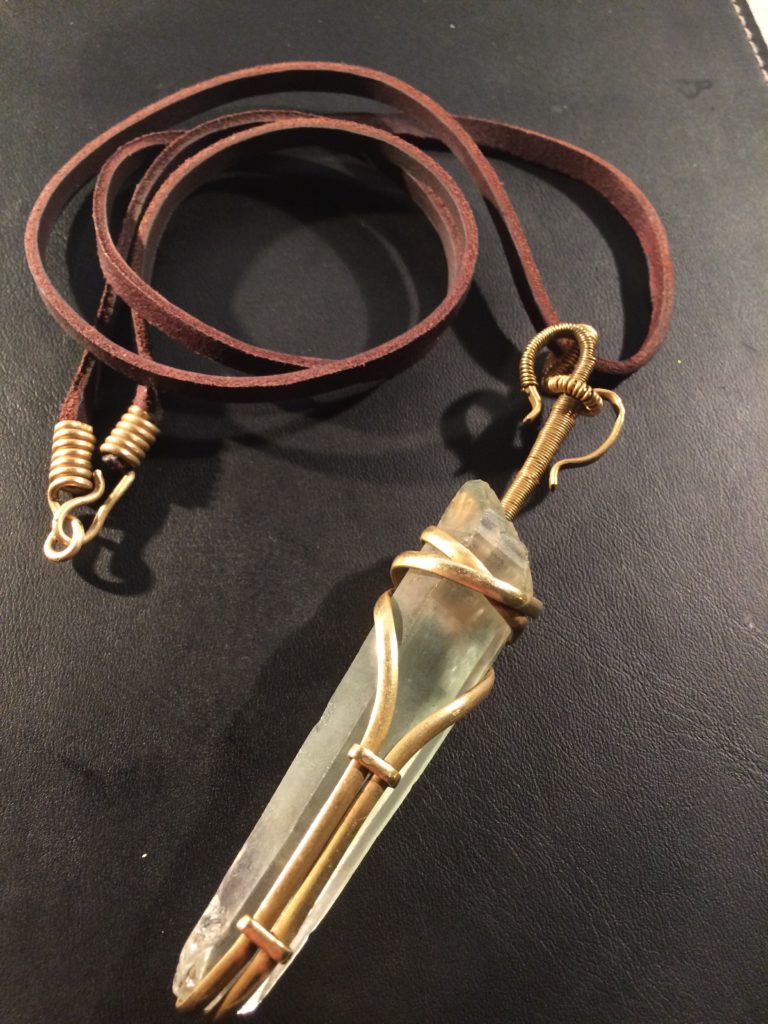rock crystal with brass wire and leather necklace